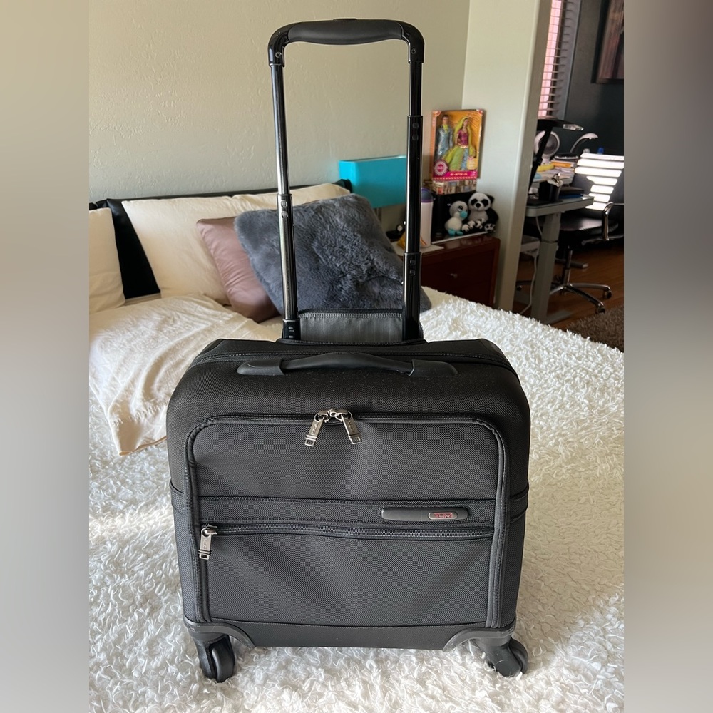TUMI, good used condition, don’t use it no more, trying to downsize